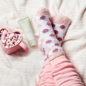 You can get 2✨FREE*✨ pairs of fuzzy socks with the purchase of Mint Bliss Lotion